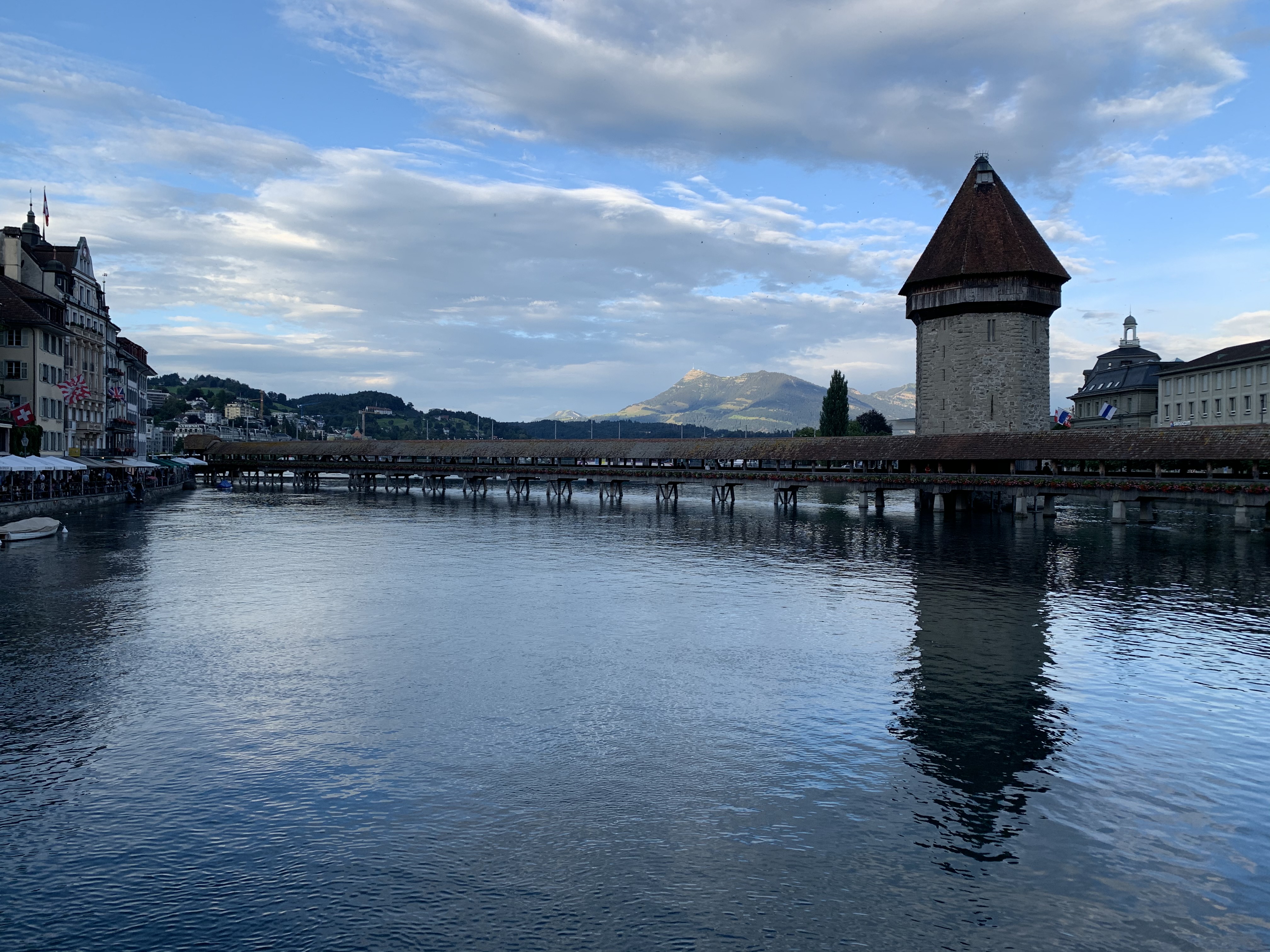 View of the Kapellbrücke, or Chapel Bridge, with the mountains in the background